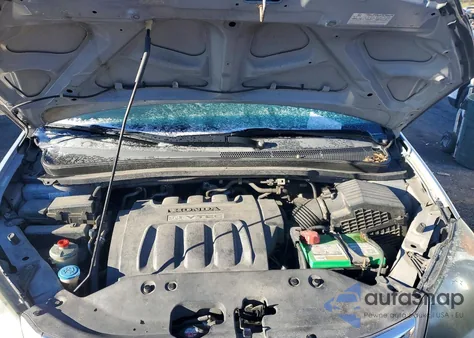 2010 Honda Odyssey Lx z USA, uszkodzony, nr VIN 5FNRL3H27AB026815